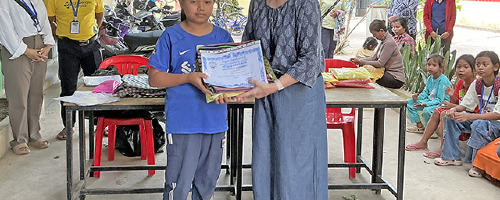 Children and youths are awarded scholarships to help them develop vocational, critical thinking and computer skills.